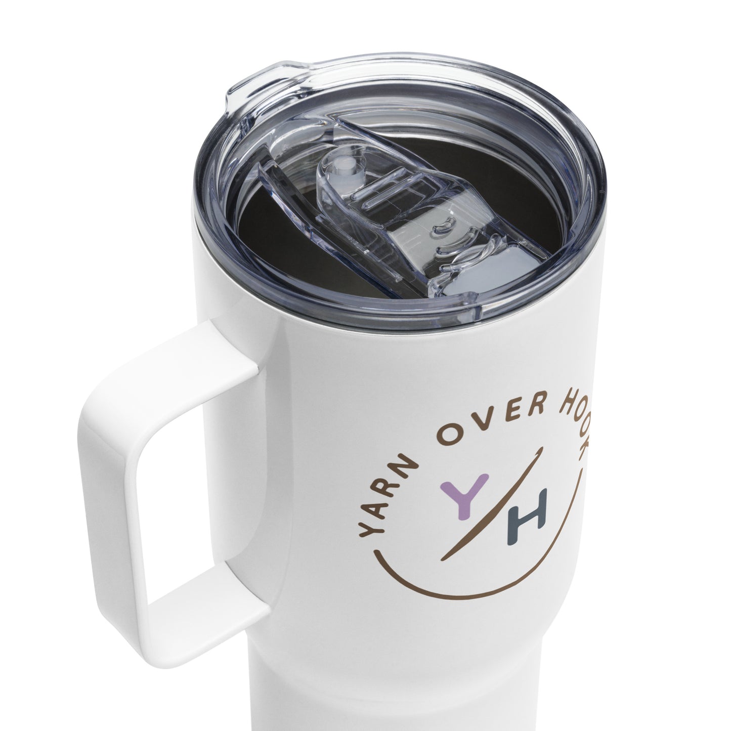 Close-up of white 25 oz Yarn Over Hook travel mug with clear lid and printed crochet community logo