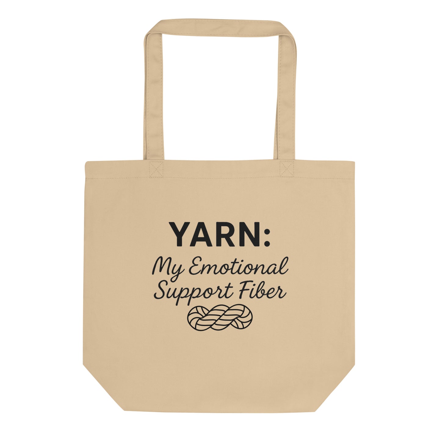 Front view of an Oyster-colored organic cotton tote bag with the black “Yarn: My Emotional Support Fiber” design and yarn skein illustration printed on the center.