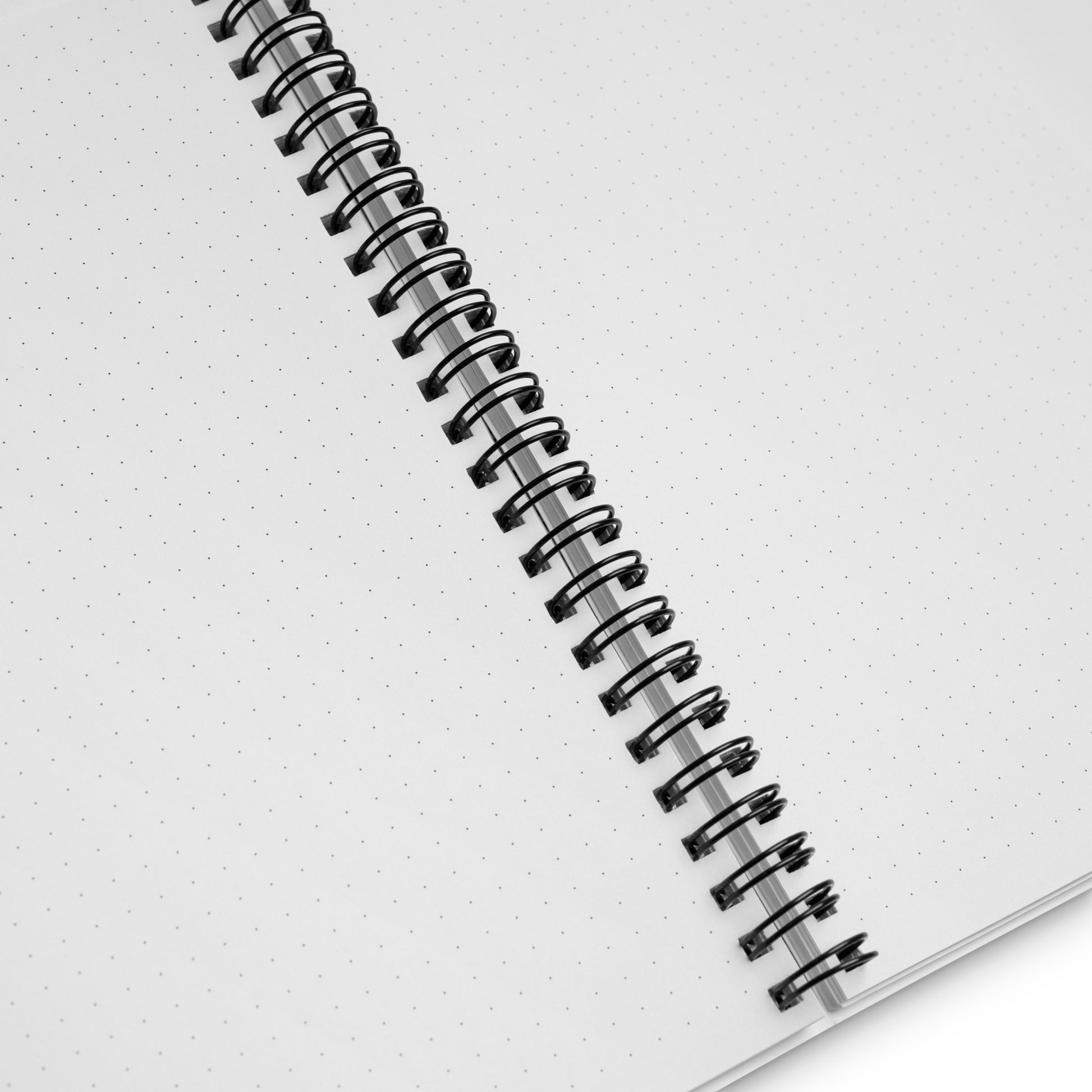 Close-up of dotted notebook pages designed for notes, planning, and sketching.