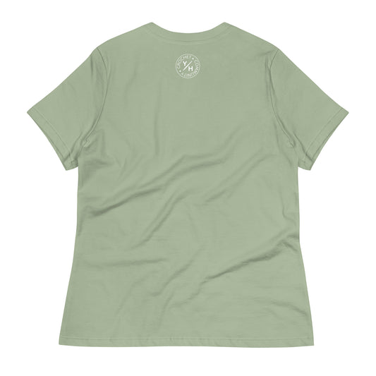 Product Back of the Stitch Sage women’s relaxed crochet t-shirt in sage green with a small white Yarn Over Hook crochet community logo near the collar.