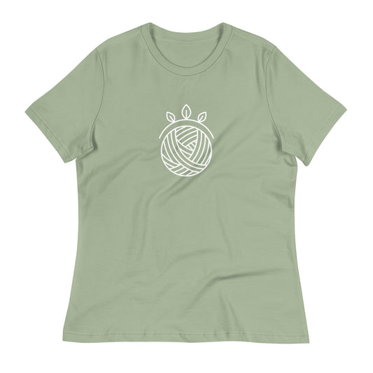 Stitch Sage women’s relaxed crochet t-shirt in sage green with a white yarn ball and leaves design on the front.