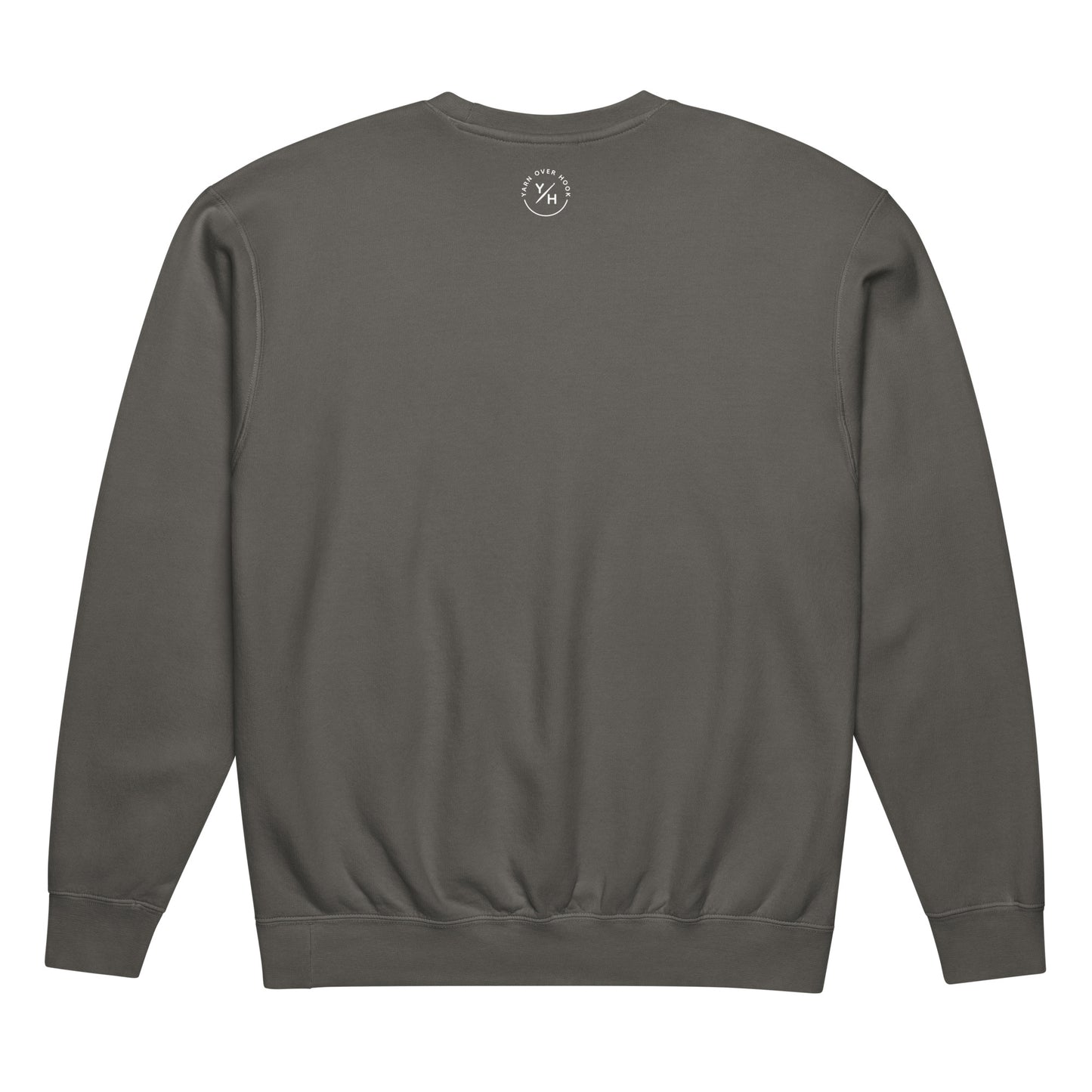 Back view of a pepper-colored Comfort Colors crewneck sweatshirt featuring a small white Yarn Over Hook logo printed below the neckline.