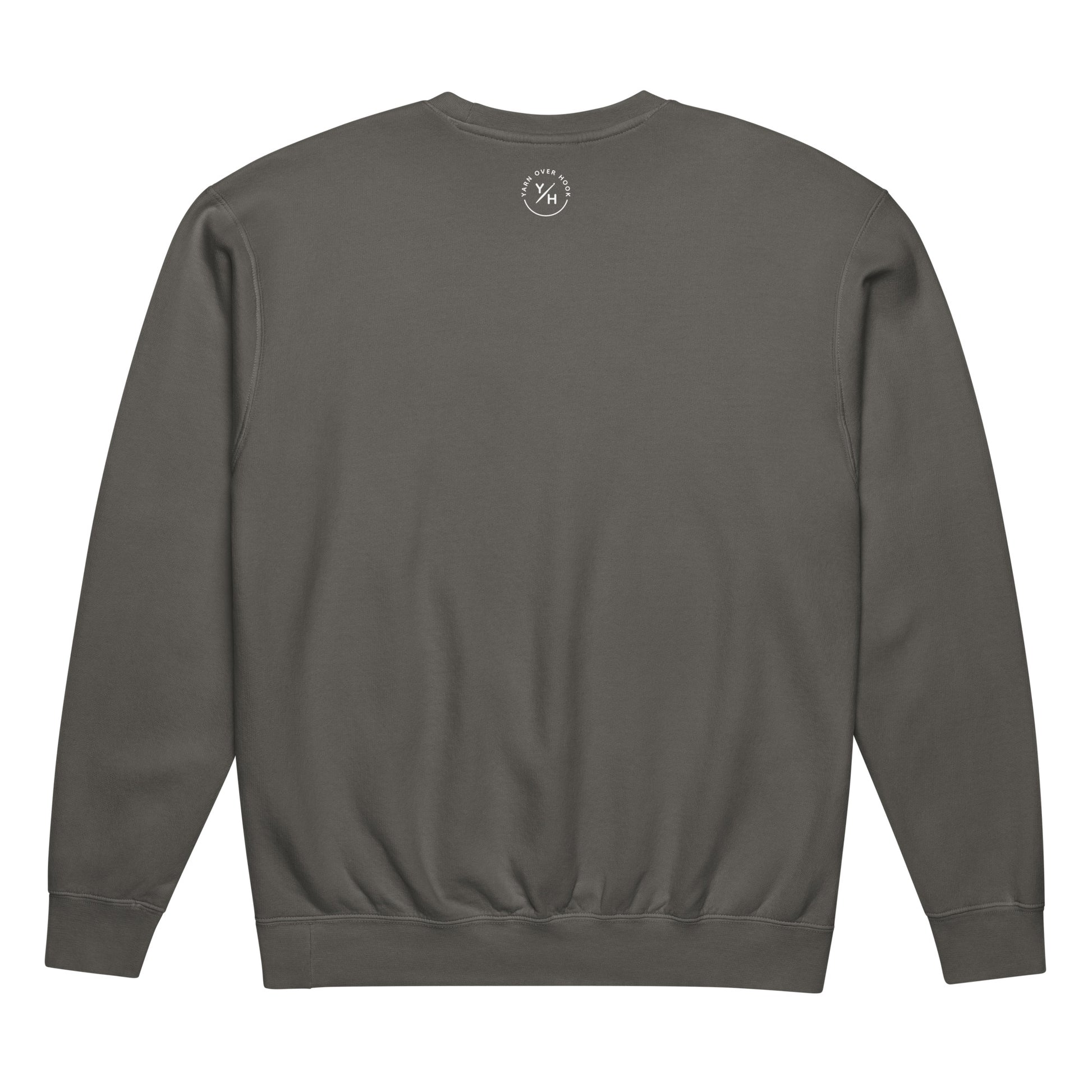 Back view of a pepper-colored Comfort Colors crewneck sweatshirt featuring a small white Yarn Over Hook logo printed below the neckline.