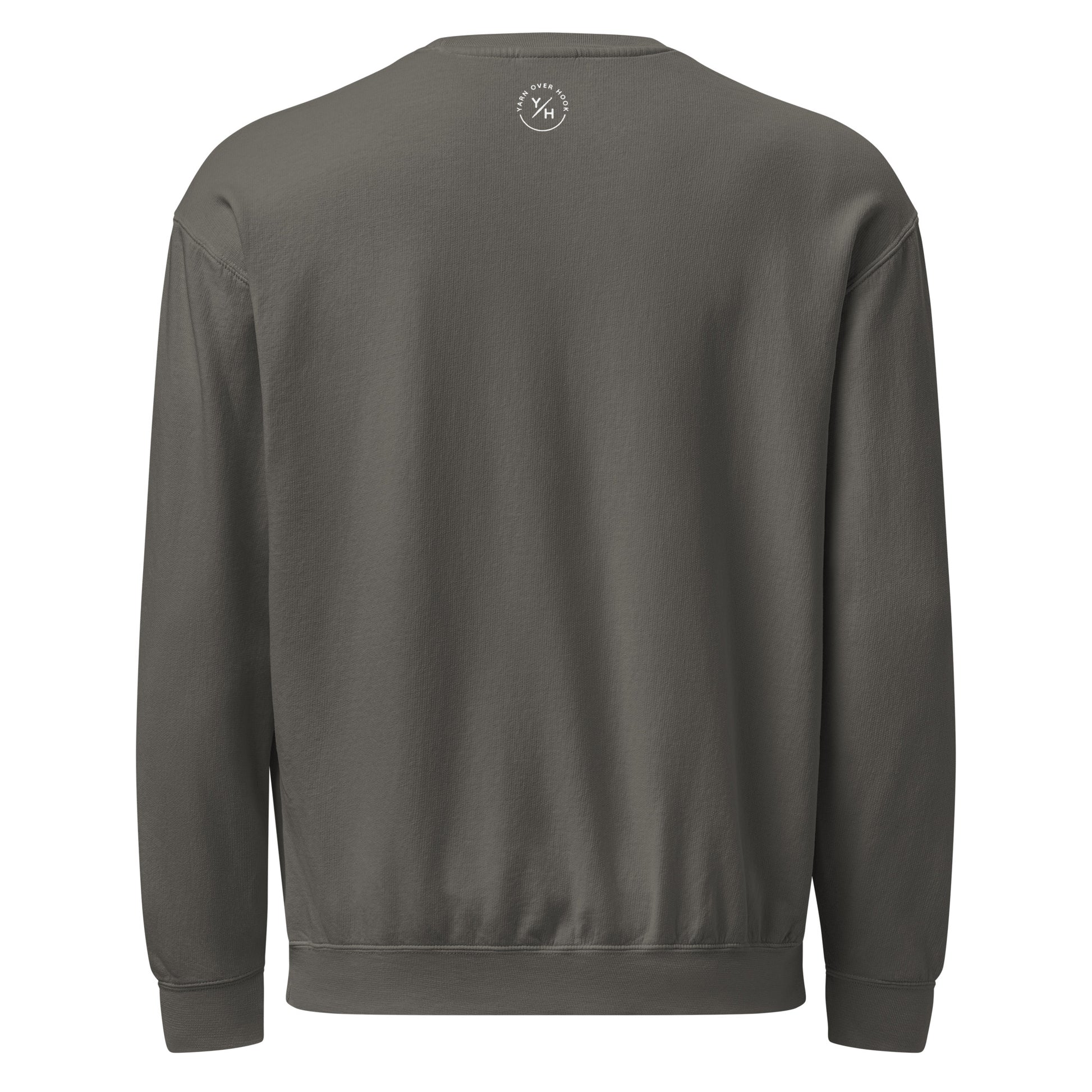 Back of a pepper-colored Comfort Colors crewneck showing the white Yarn Over Hook emblem centered just below the collar.