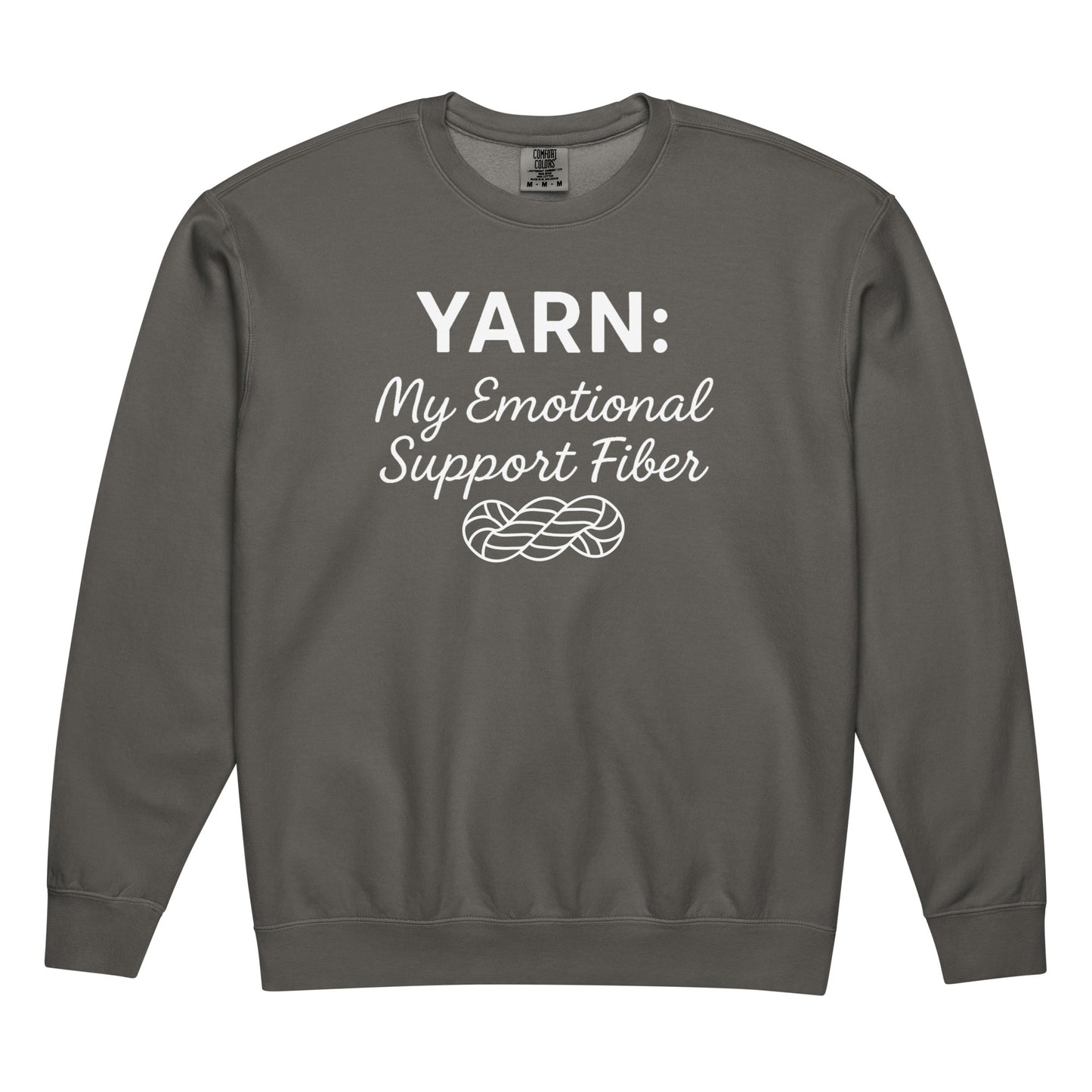 Flat-lay front view of a pepper-colored Comfort Colors crewneck sweatshirt with the white “Yarn: My Emotional Support Fiber” design and yarn skein graphic.