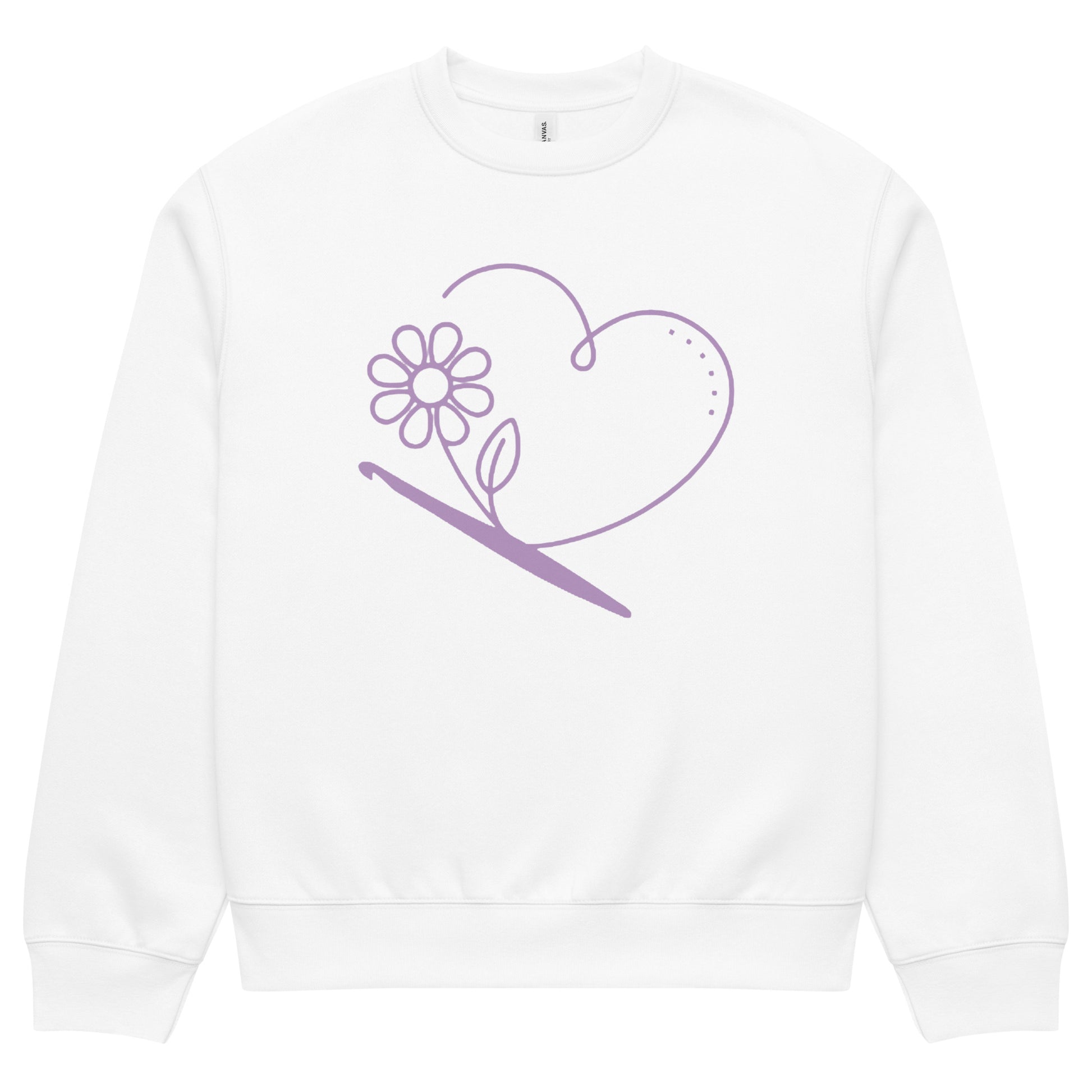 White oversized unisex sweatshirt featuring the ‘Looped With Love’ minimalist line-art heart, flower, and crochet hook design.