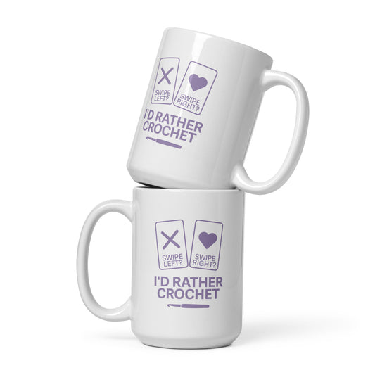 White 15 oz mug with purple ‘I’d Rather Crochet’ design on both sides against neutral background