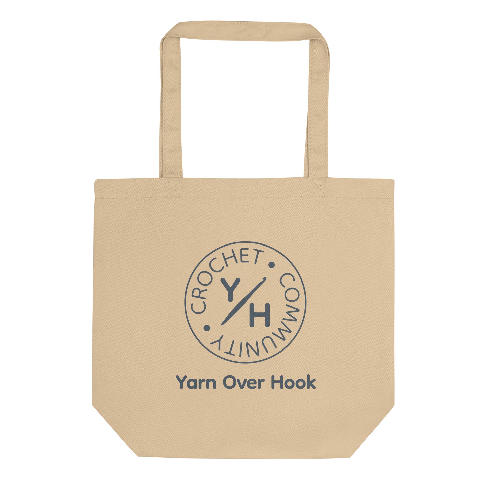 Oyster organic cotton tote bag with Yarn Over Hook Crochet Community logo printed in slate on the front.