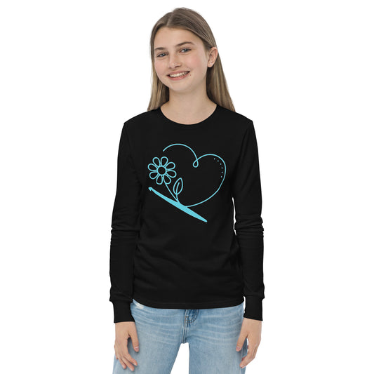 Smiling youth wearing black long sleeve Looped With Love crochet tee.